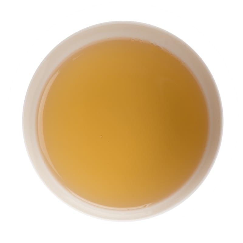 Robe du thé vert Yunnan en tasse